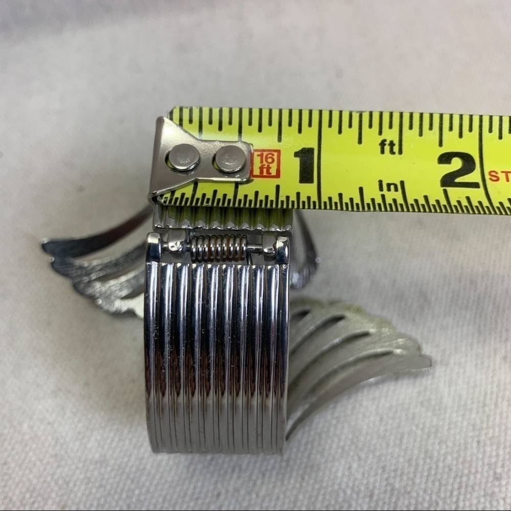 Silver tone wing shaped hinged Bangle Bracelet - Picture 3 of 4